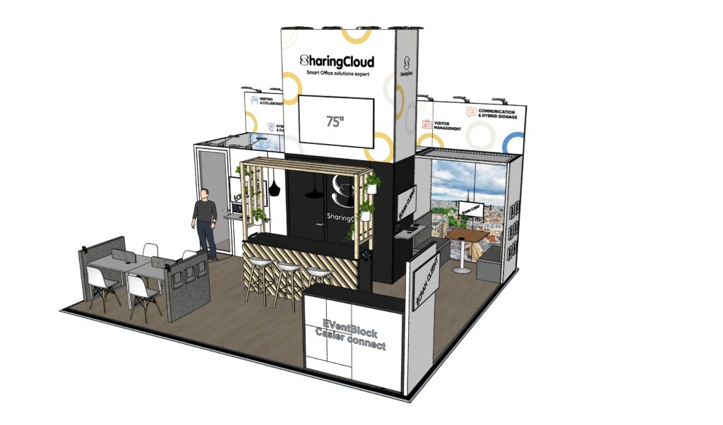 Stand SharingCloud : un espace à la fois accueillant et structuré, mettant en valeur les solutions Smart Office à travers une scénographie fluide, des zones de démonstration immersives et un bar central favorisant l’échange et la convivialité.