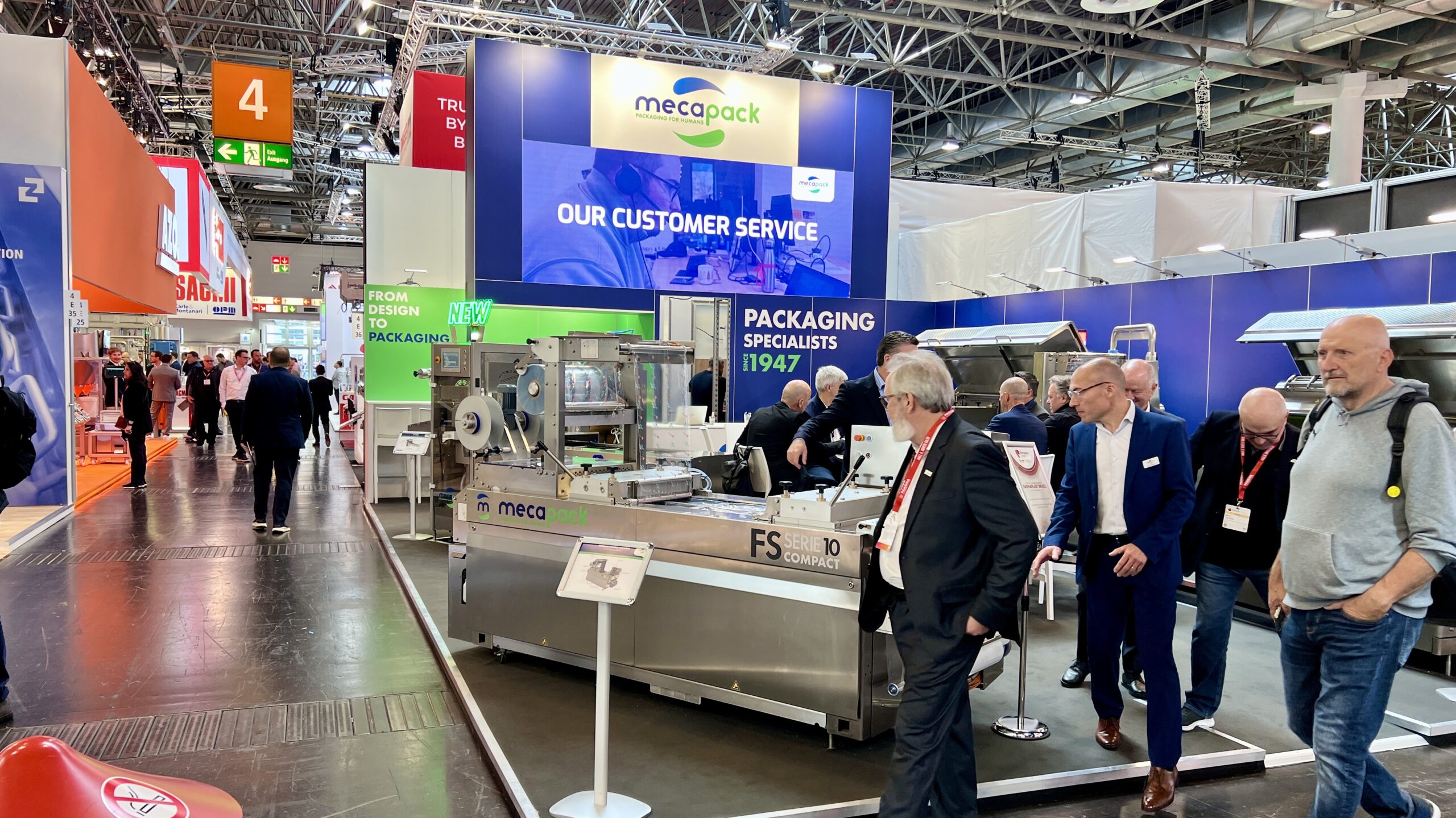 Stand Mecapack conçu par Affaire d'Idées — Interpack 2026, hall 4 E36, vue d'ensemble